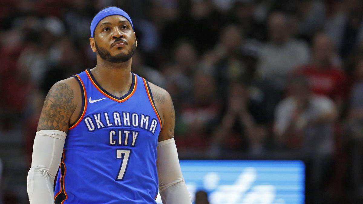 Oklahoma City Thunder forward Carmelo Anthony looks on during the first quarter of an NBA basketball game against Miami Heat at the AmericanAirlines Arena in Miami on Monday, April 9, 2018.