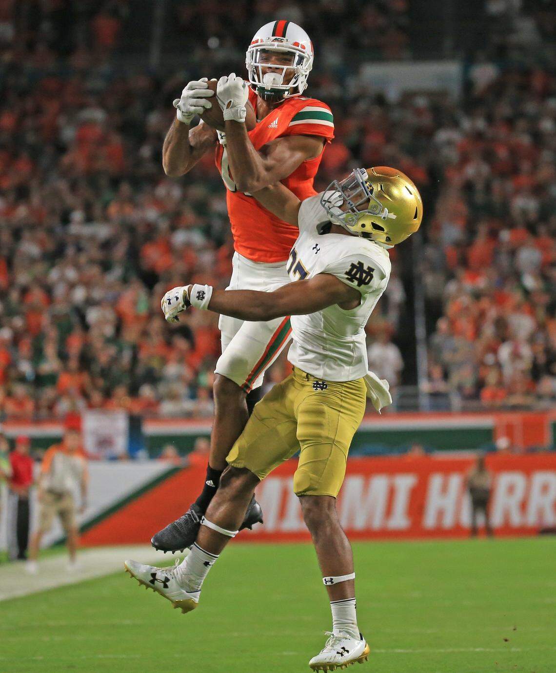 Miami Hurricanes wide receiver Lawrence Cager makes a reception for a first down in 2017 against Notre Dame.