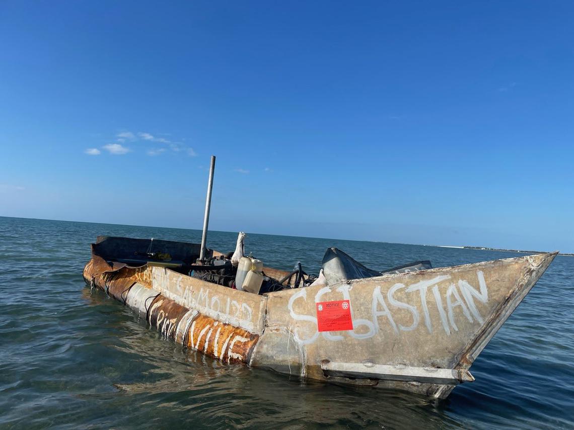 A makeshift migrant boat floats just offshore Long Key in the Florida Keys Friday morning, Feb. 3, 2023. The U.S. Border Patrol said 29 people from Cuba were aboard. 
