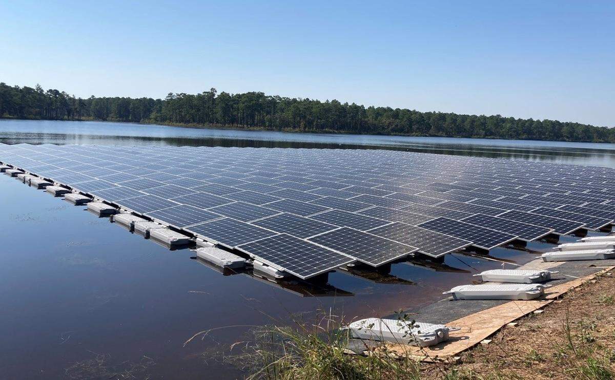 Fort Bragg - floating solar array.jpg: Fort Bragg and Duke Energy installed a floating solar array on Big Muddy Lake in 2022 to provide supplemental and backup power. The project reflected the military’s push to boost readiness through renewable energy. Now, however, Pentagon leaders are retreating from climate change plans. 
