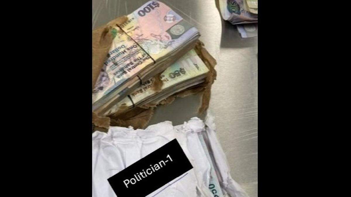 Bundles of cash that federal officials say a man was carrying when the plane he was on crashed in the ocean off Melbourne, Florida, on Tuesday, May 12, 2026.
