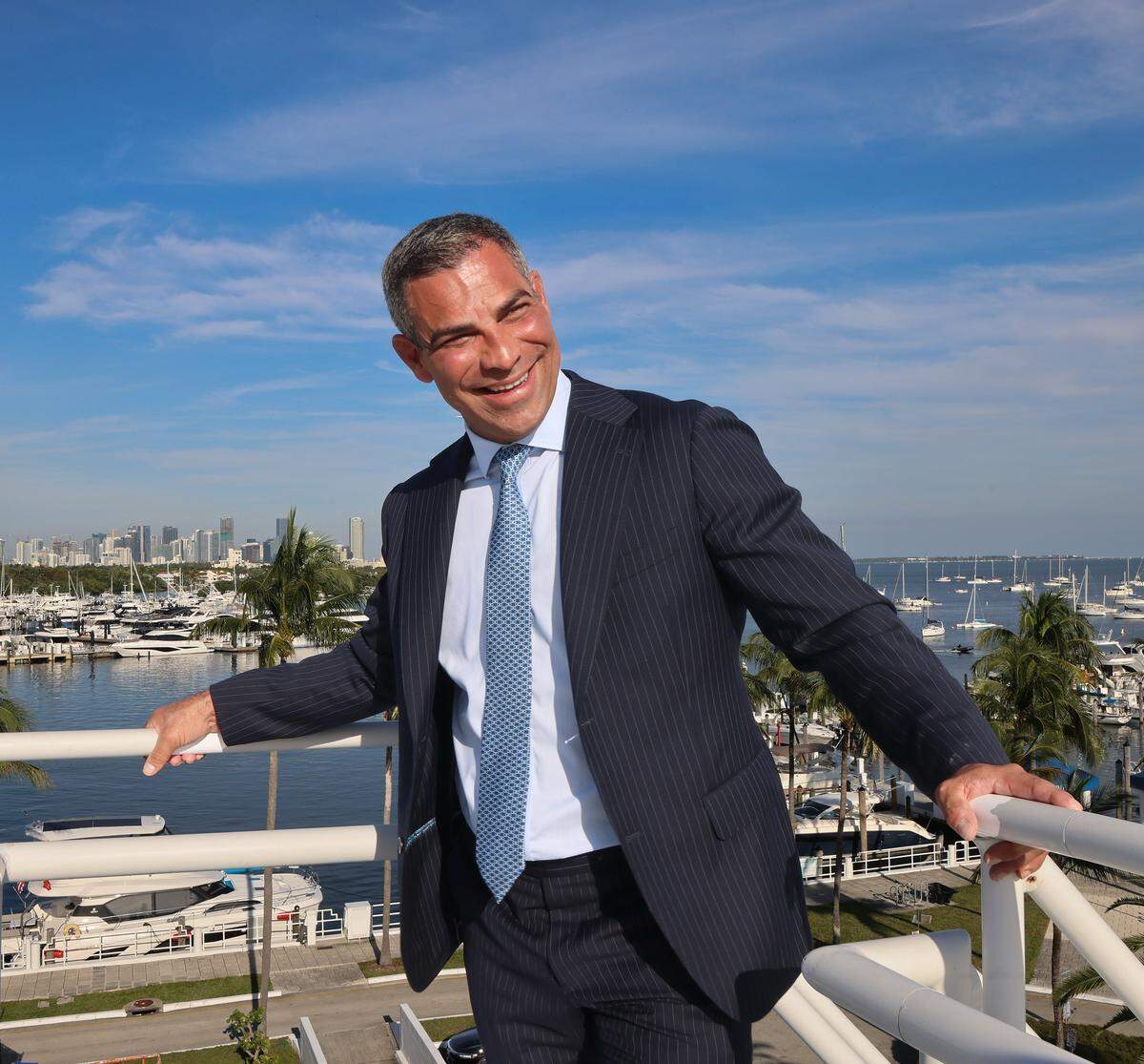 Two-term mayor, Francis X. Suarez, takes in the view at one of his favorite places — the roof of City Hall where he would often visit to reflect and gather his thoughts, on Thursday, Dec. 11, 2025, in Miami, Fla.