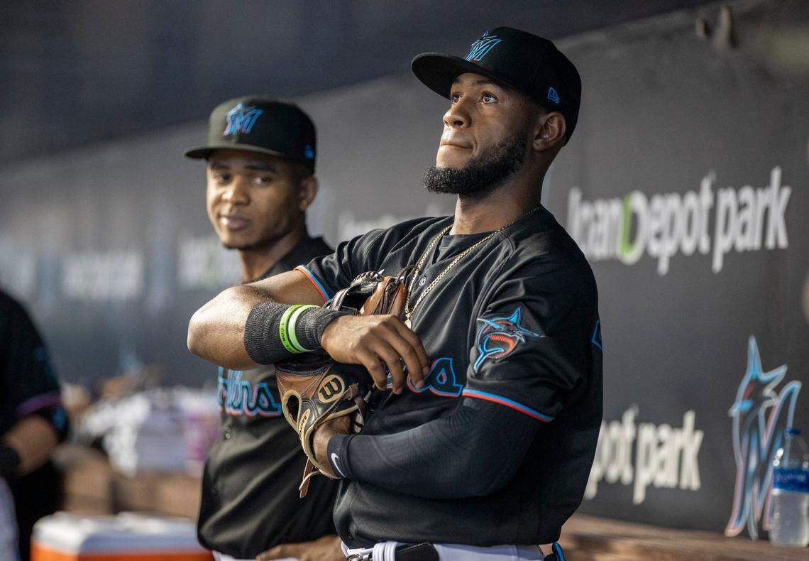 Miami Marlins outfielder Bryan De La Cruz, looks on from the dugout before the start of the baseball game against the New York Yankees at loanDepotpark in Miami on Friday, July 30, 2021.