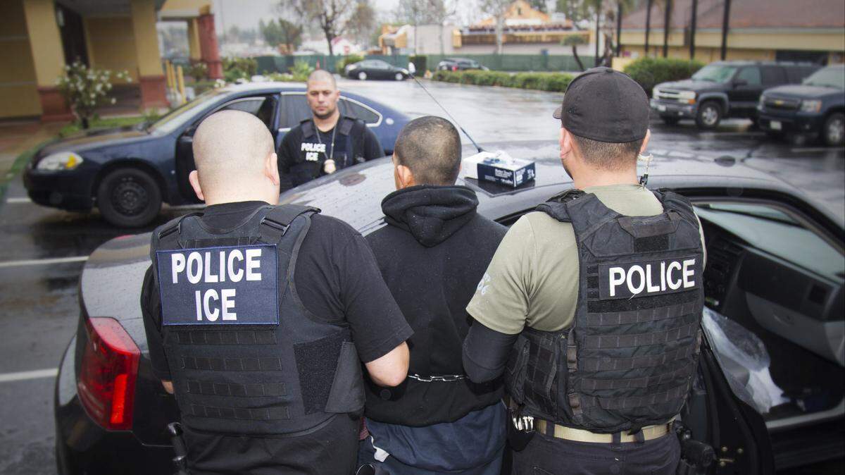 In this photo taken Feb. 7, 2017, released by U.S. Immigration and Customs Enforcement, an arrest is made during a targeted enforcement operation conducted in Los Angeles.