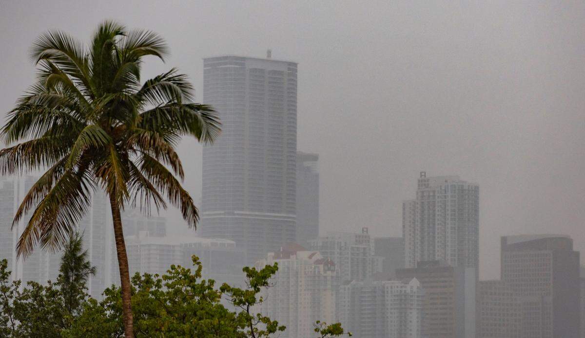 A view of Brickell from Hobie Island Beach Park as lightning and heavy rain falls in the area on Monday, June 19, 2023, in Miami, Fla.