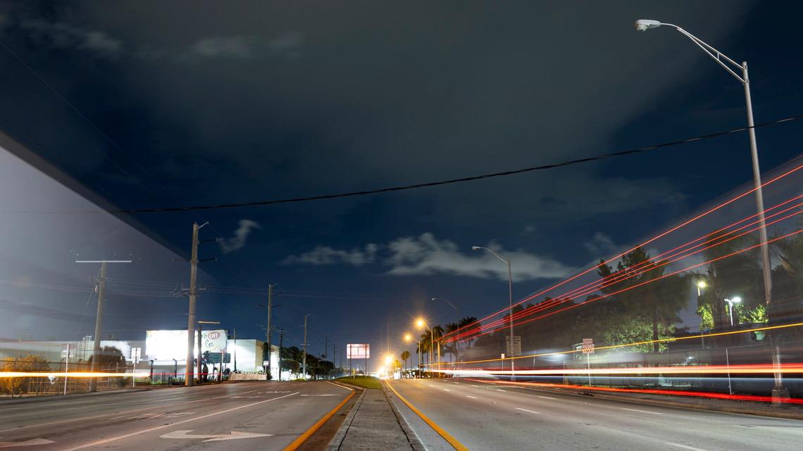Traffic makes its way past non-working streetlights near the intersection of Northwest 36th Street and Milam Dairy Road on Tuesday, Sept. 3, 2024, in Miami, Fla. There is a meeting at 7 p.m. Monday, Sept. 9, at Virginia Gardens Village Hall to discuss the non-operational streetlights along Northwest 36th Street.