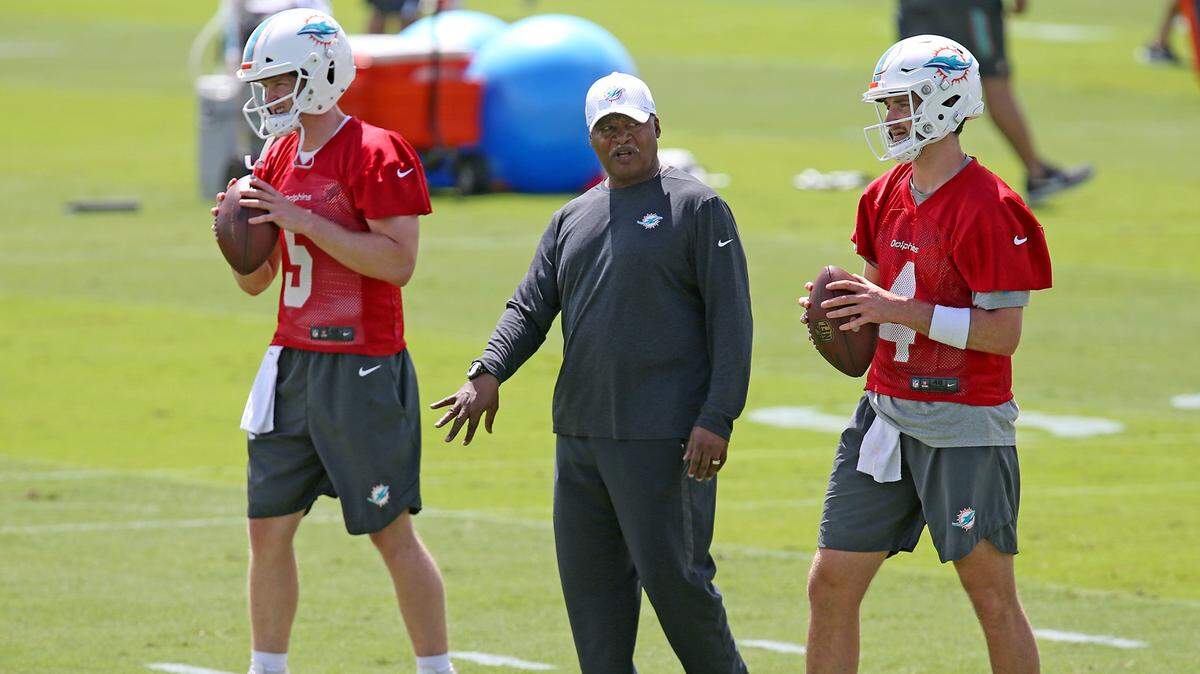Dolphins assistant coach Jim Caldwell, center, is taking a leave of absence in 2019 to deal with an unspecified health issue.