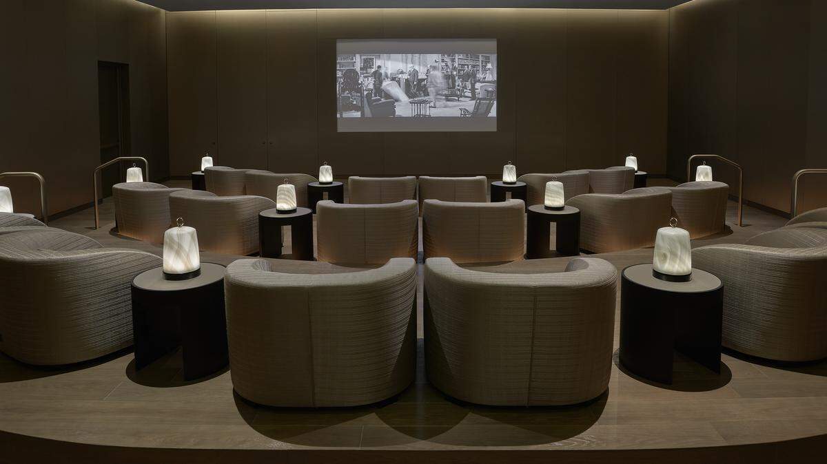 The movie theater in Residences by Armani/Casa, shown above, has over 15 seats.