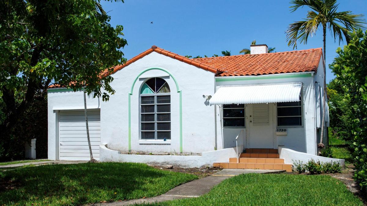 The three-bedroom historic house at 1735 Lenox Ave., pictured above, would be partially demolished, renovated and enlarged, according to a proposal submitted to the Miami Beach Historic Preservation Board. 