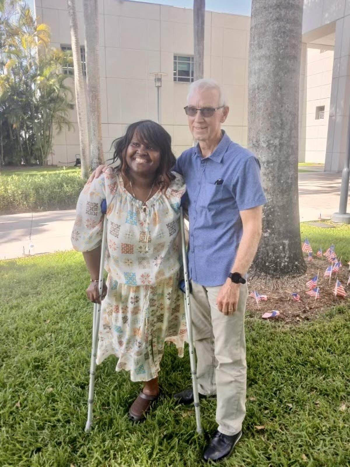 Shanreka Perry and her physical therapist, Curtis Clark. When Shanreka was 10 years old, she was pinned between a car and a building during the McDuffie riot in Liberty City, causing her to lose one of her legs.
