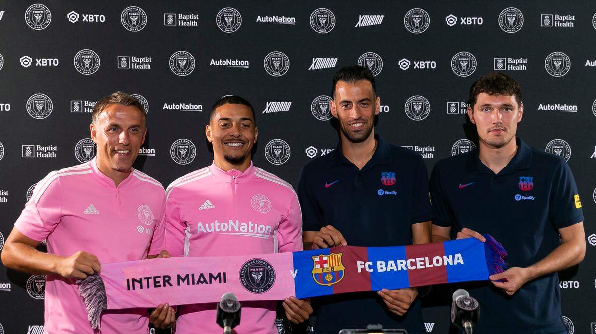 From left to right: Inter Miami Head Coach Phil Neville, Inter Miami midfielder Gregore Silva (26), FC Barcelona midfielder Sergio Busquets (5), and FC Barcelona defender Andreas Christensen attend a press conference in advance of their friendly match at DRV PNK Stadium on July 18, 2022. Busquets is leaving Barca after 18 years, and considering a move to Inter Miami.