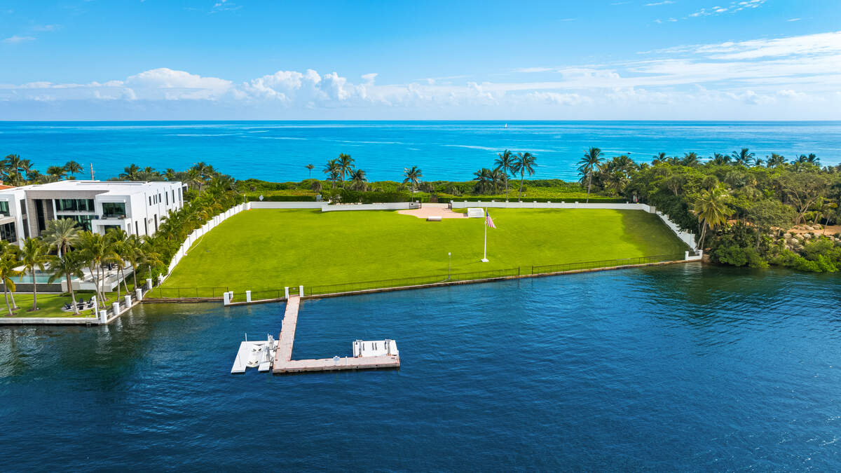 The lot purchased by billionaires Larry Ellison and David MacNeil is located on Manalapan’s billionaire’s row.
