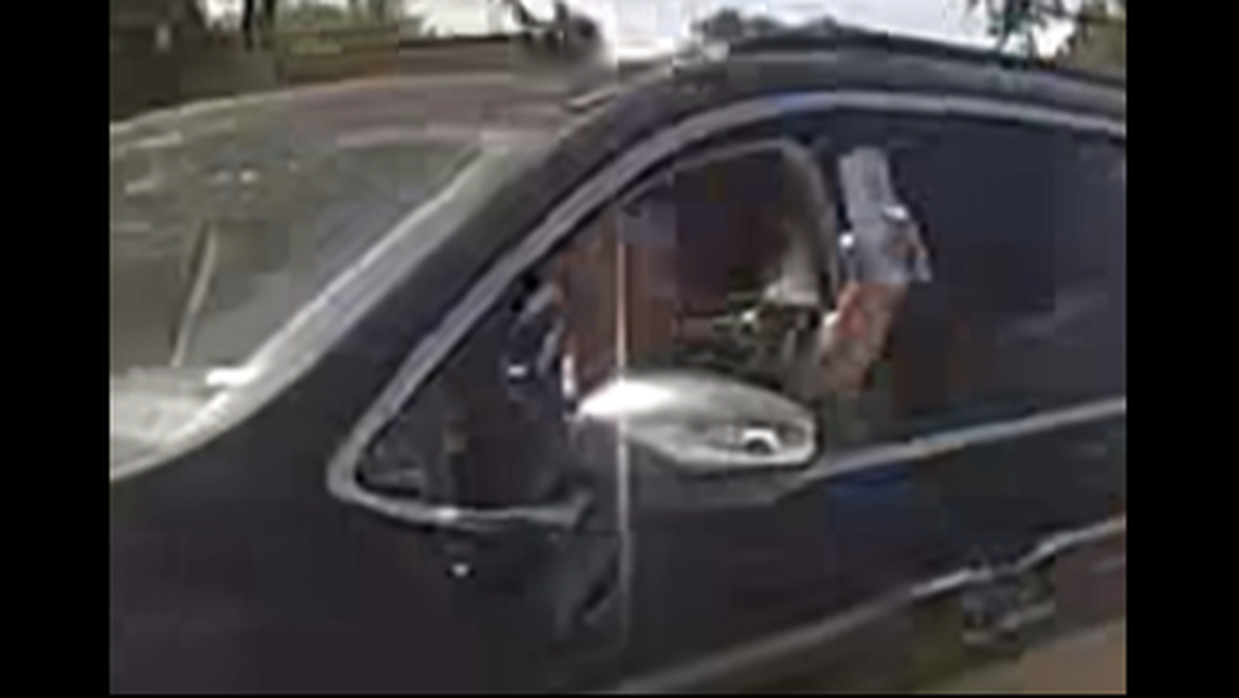 A man suspected of drunk driving slowed down at a road block to offer a cocktail to one of the deputies, Florida body cam video shows.
