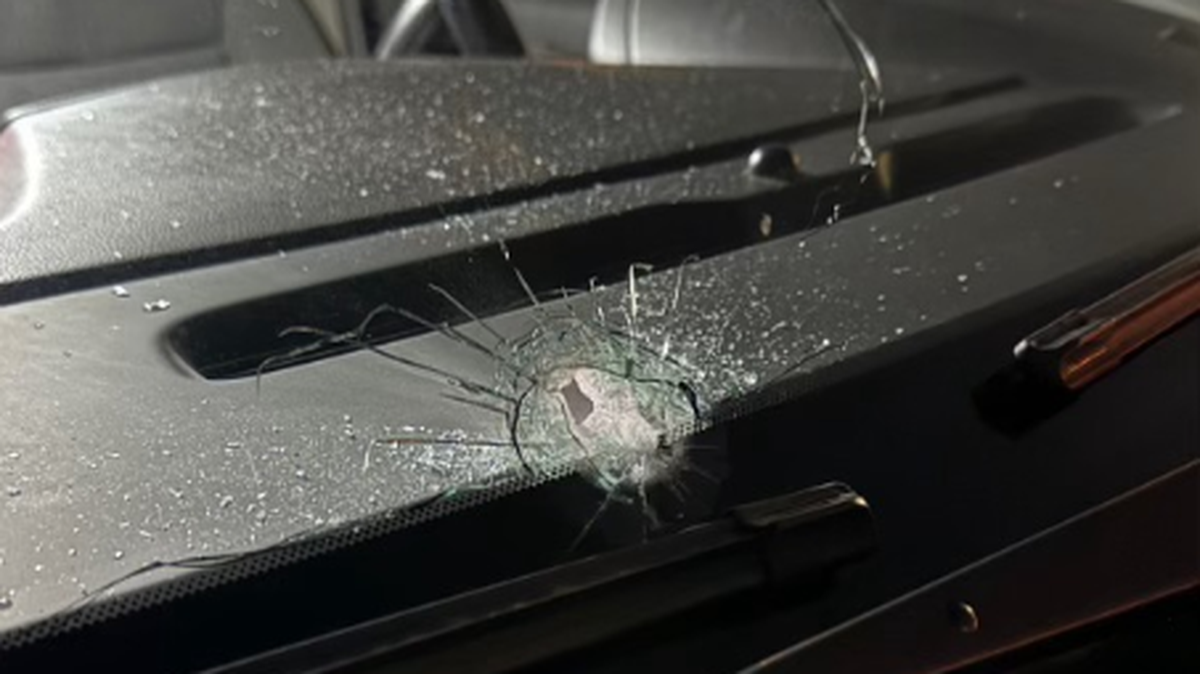 A bullet hole is shown impacting the windshield of a Broward Sheriff’s Office patrol car Wednesday, Aug. 7, 2024.