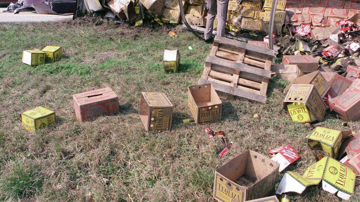 Highway Patrol Lt. Bill Leeper inspects an overturned truck on I-95 just south of Pecan Park Road Wednesday, Feb. 10, 1999 in Jacksonville, Fla. The truck, which spilled cases of beer all over the interstate median, blocked the southbound lane and slowed traffic for miles.