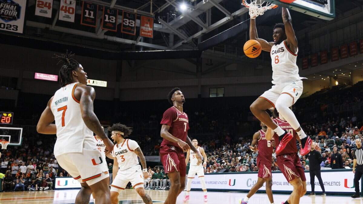 Miami Hurricanes center Ernest Udeh Jr. (8) dunks the ball during the first half of the game against the Florida State Seminoles on Tuesday, Jan. 20, 2026, at Watsco Center in Coral Gables, Fla.