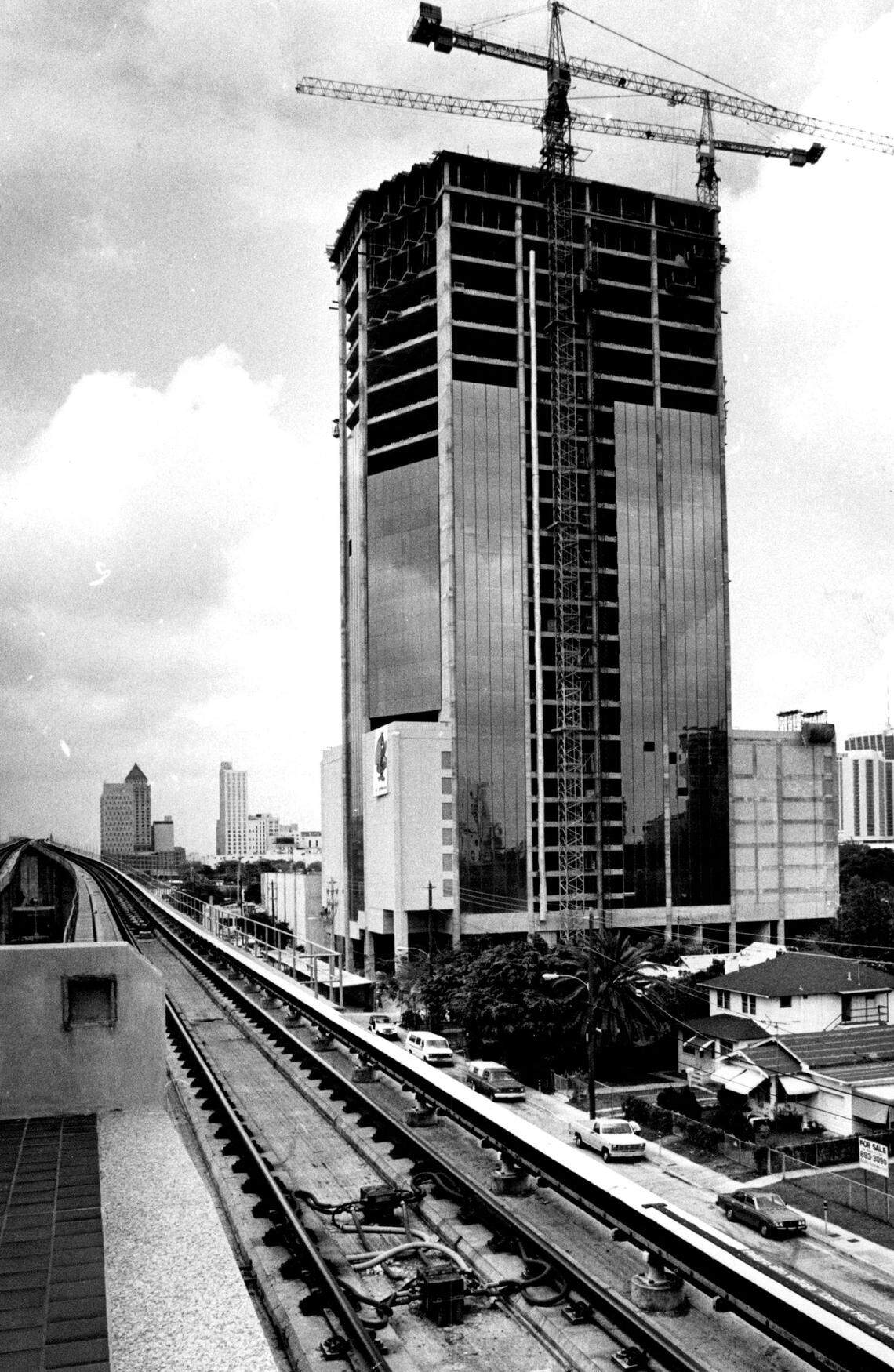 The 27-story Brickell Station towers under construction.