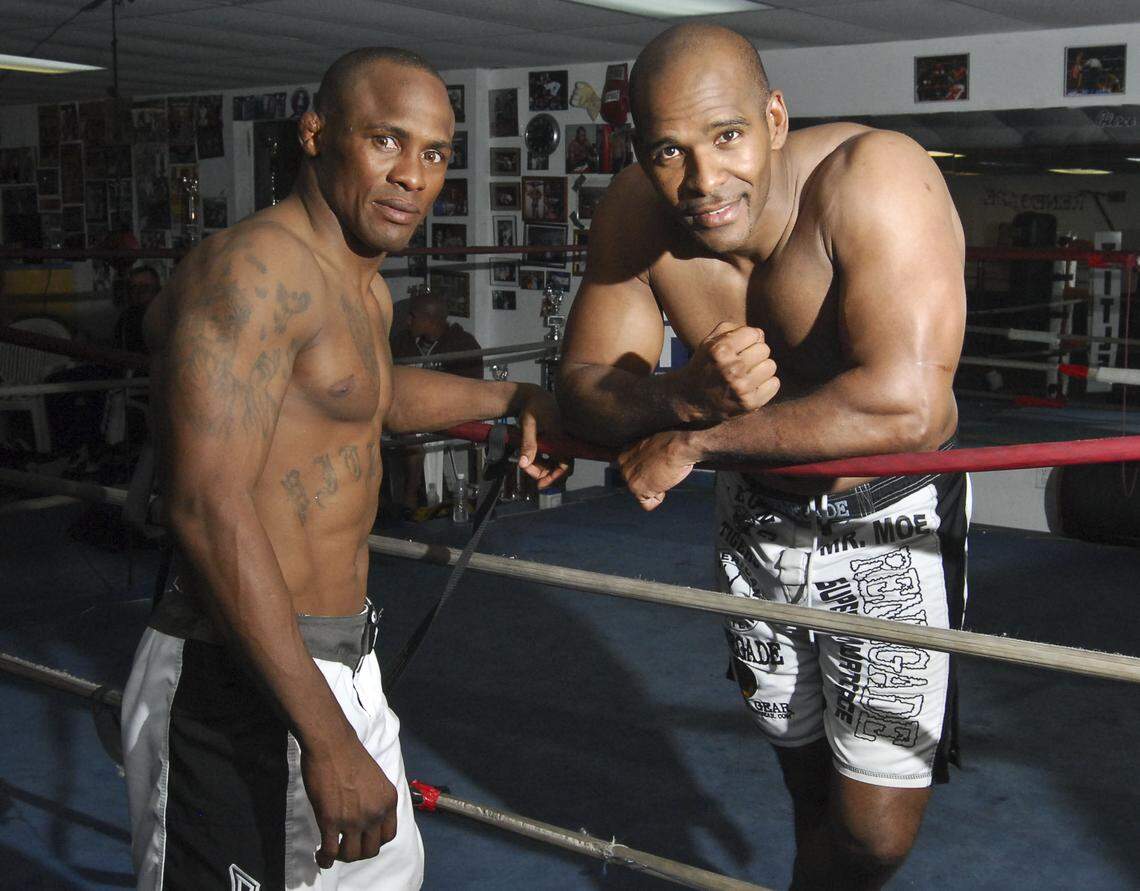 Mixed-martial arts fighters Alexis Vila Perdomo (left) and Ariel Gandulla at the Young Tigers gym in Miami in 2008.  Both are facing charges relating to a 2011 murder in Miami.