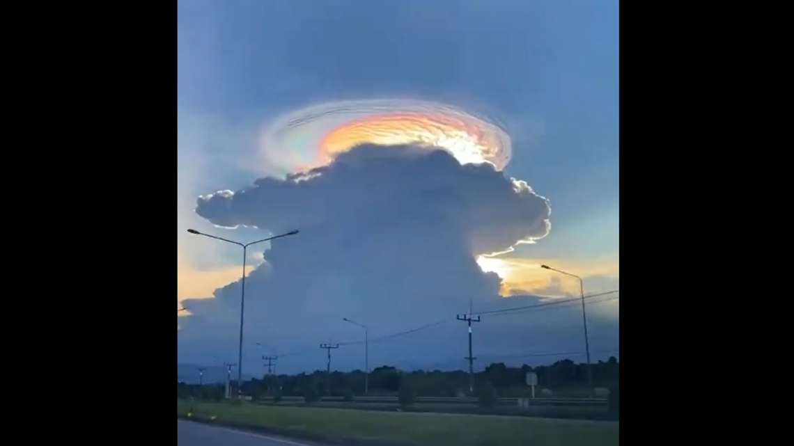 An iridescent cloud can be seen in the sky near Mount Budo, Narathiwat Province, Thailand, according to Twitter user Reg Saddler.