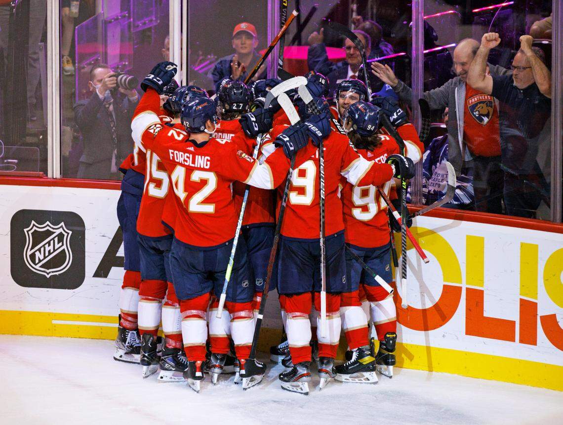 Florida Panthers left wing Jonathan Huberdeau (11) celebrate with teammates after scoring the winning goal against Toronto Maple Leafs goaltender Jack Campbell (36) during overtime of an NHL game at the FLA Live Arena on Tuesday, April 5, 2022 in Sunrise, Fl.
