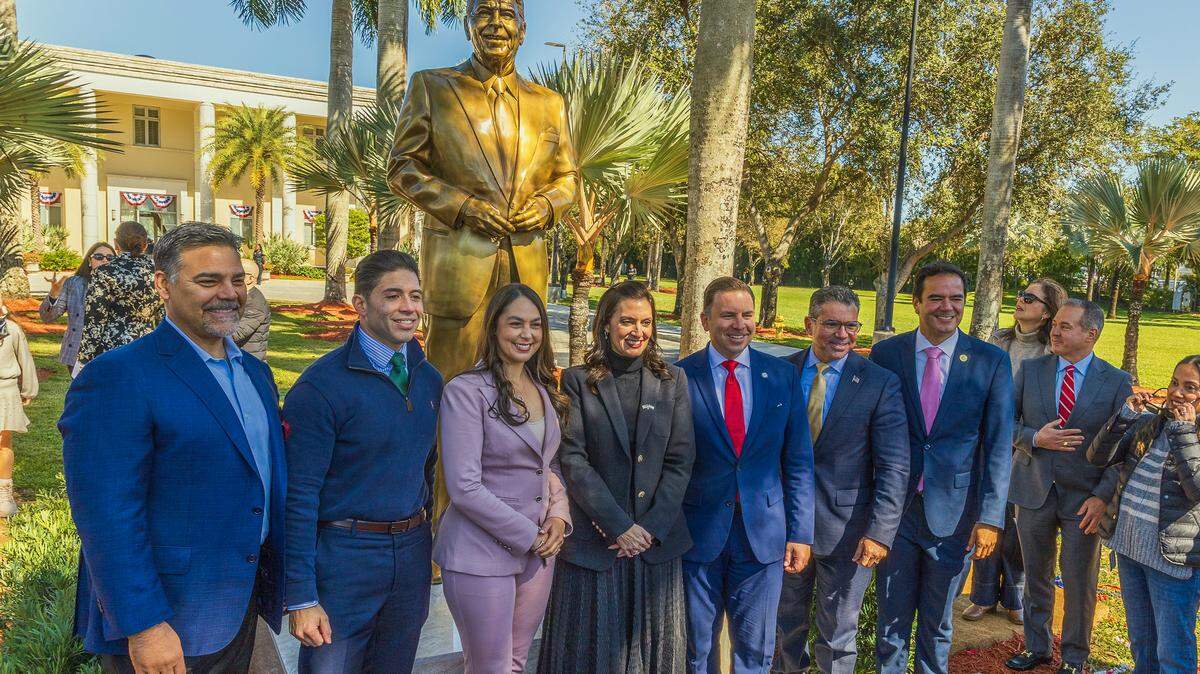 A group of local and state elected officials joined Florida International University President Jeanette Nuñez (fourth from left) during the unveiling ceremony of a statue of former President Ronald Reagan, on Feb. 6, 2026