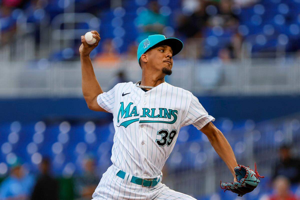Miami Marlins starting pitcher Eury Perez (39) delivers a pitch against the Cincinnati Reds during the first inning at loanDepot Park on Friday, May 12, 2023.