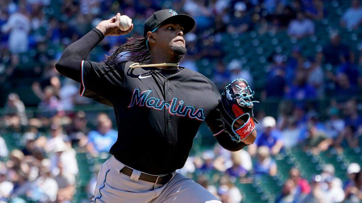 Miami Marlins starting pitcher Edward Cabrera delivers during the first inning of a baseball game against the Chicago Cubs Friday, Aug. 5, 2022, in Chicago. (AP Photo/Charles Rex Arbogast)