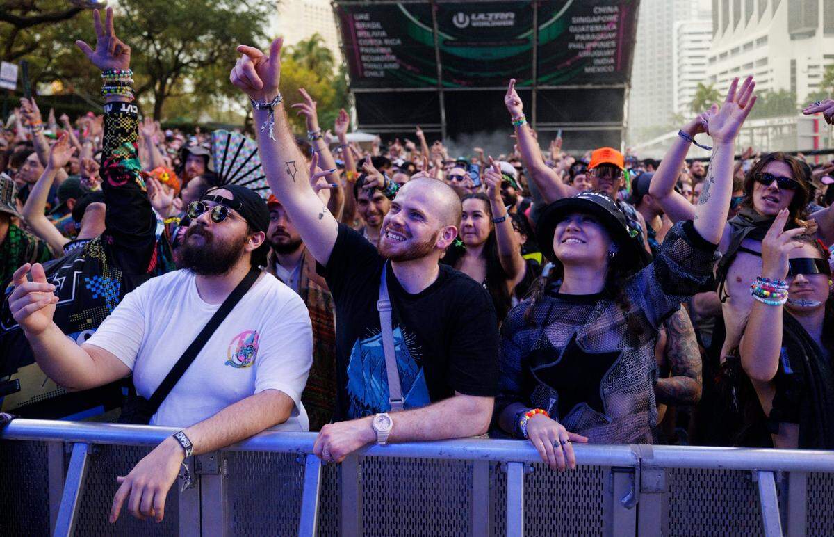 Attendees dance at the Worldwide Stage during the third day of Ultra Music Festival on Sunday, March 30, 2025, at Bayfront Park in downtown Miami, Fla. 