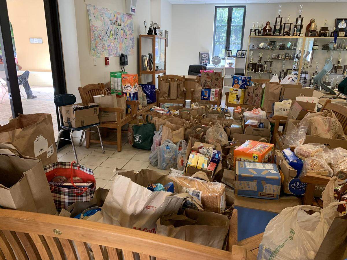 Students at Carrollton School of the Sacred Heart recently participated in a food drive for the Thelma Gibson Health Initiative, where they donated food and essential items to help lothers during the COVID-19 crisis.