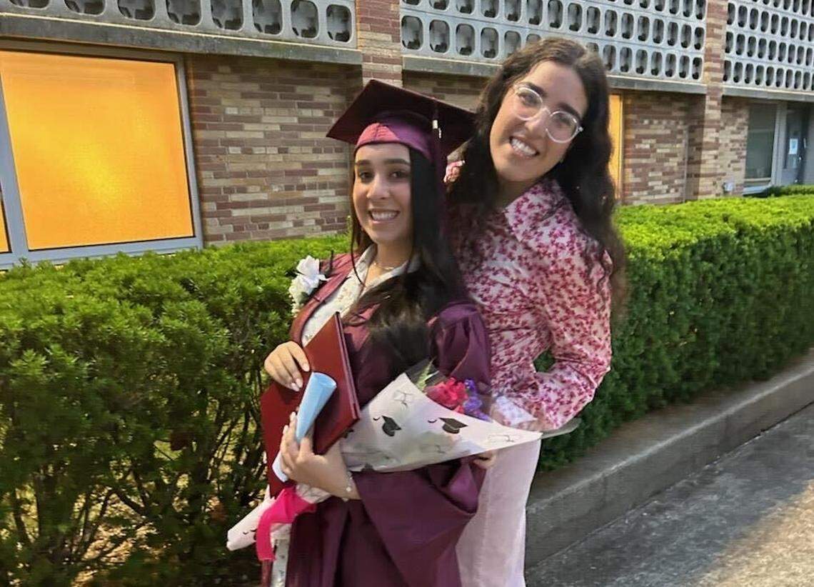 Rachel Aliza Nisanov, 13, left, and her sister, Aviva Bracha Nisanov, 16, right.