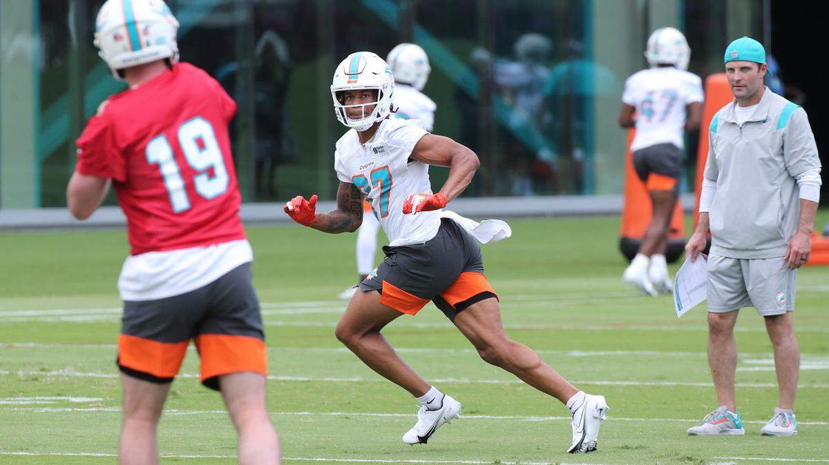 Miami Dolphins wide receiver Erik Ezukanma (87) runs drills during Dolphins Rookie Minicamp at the Baptist Health Training Complex in Miami Gardens on Friday, May 13, 2022.