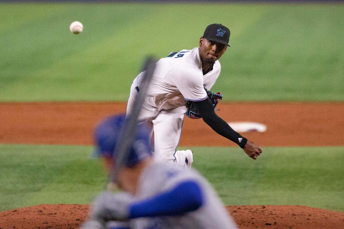 Miami Marlins starting pitcher Edward Cabrera (27) pitches during the third inning of an MLB game against the Los Angeles Dodgers at loanDepot park in Miami, Florida, on Sunday, August 28, 2022.