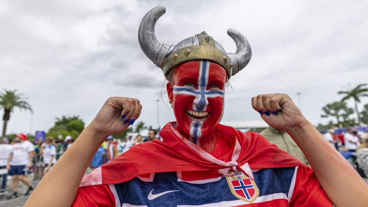 Norway fan Charlotte Bjercke cheers as she arrives to watch her team play against England in a FIFA World Cup 2026 Quarter Final soccer match at Hard Rock Stadium (Miami Stadium) on Saturday, July 11, 2026 in Miami Gardens, Fla.