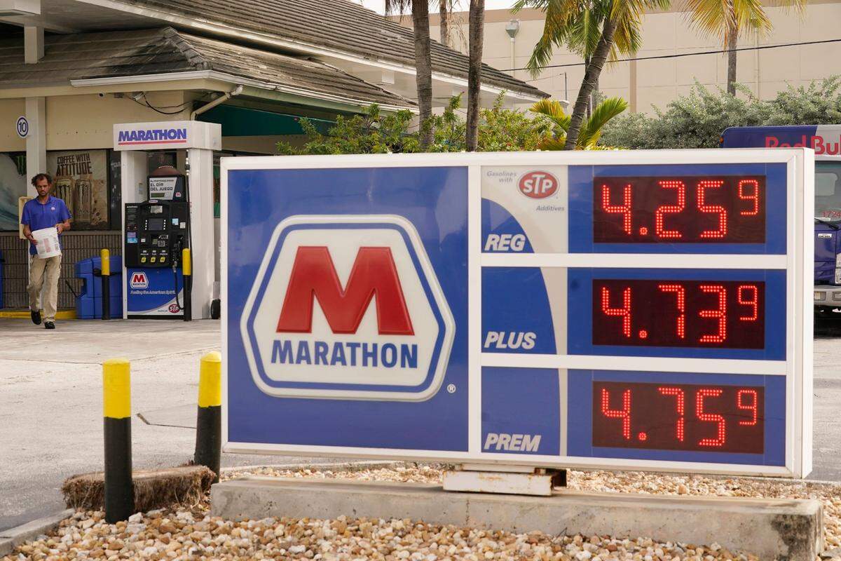 Gasoline prices are displayed at a Marathon station, Wednesday, Nov. 17, 2021, in Miami Beach, Fla.