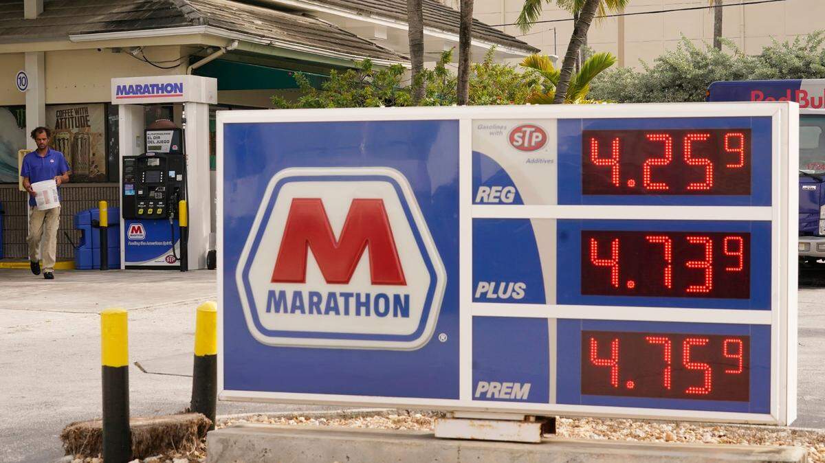 Gasoline prices are displayed at a Marathon station, Wednesday, Nov. 17, 2021, in Miami Beach, Fla.