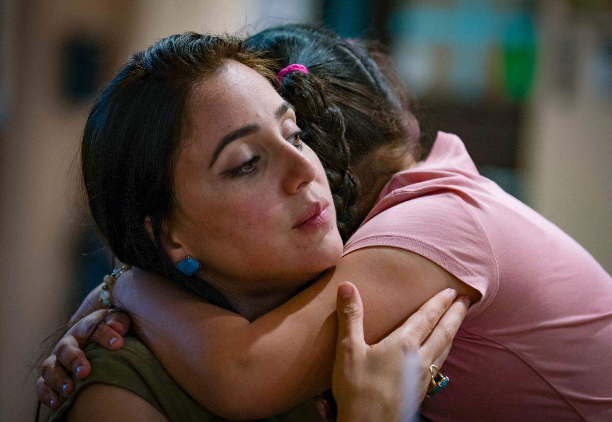 Doral 2024 Mayoral candidate Roxanna Garay hugs her daughter Franchesca Garay at La Matriarca restaurant on Election Night on Tuesday, Nov. 5, 2024, in Doral, Fla.