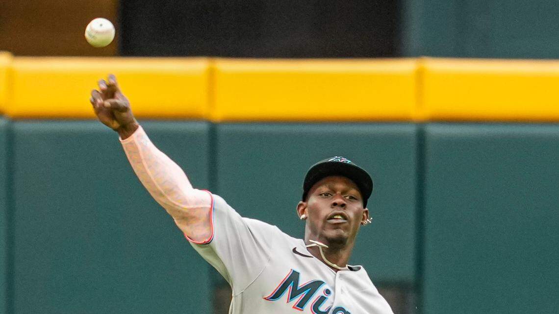 Jul 1, 2023; Cumberland, Georgia, USA; Miami Marlins center fielder Jazz Chisholm Jr. (2) throws the ball after catching a fly ball against the Atlanta Braves during the eighth inning at Truist Park. Mandatory Credit: Dale Zanine-USA TODAY Sports