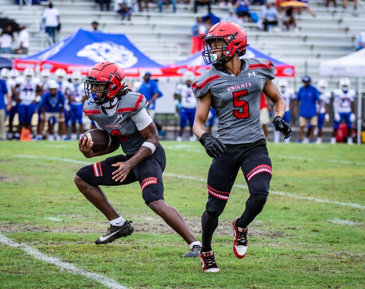 Monarch Knights wide receiver Samari Reed (0) runs with the ball in the first half of his football game against the Peachtree Ridge Lions at Coconut Creek High School on Thursday, Aug. 22, 2024, in Coconut Creek, Fla.
