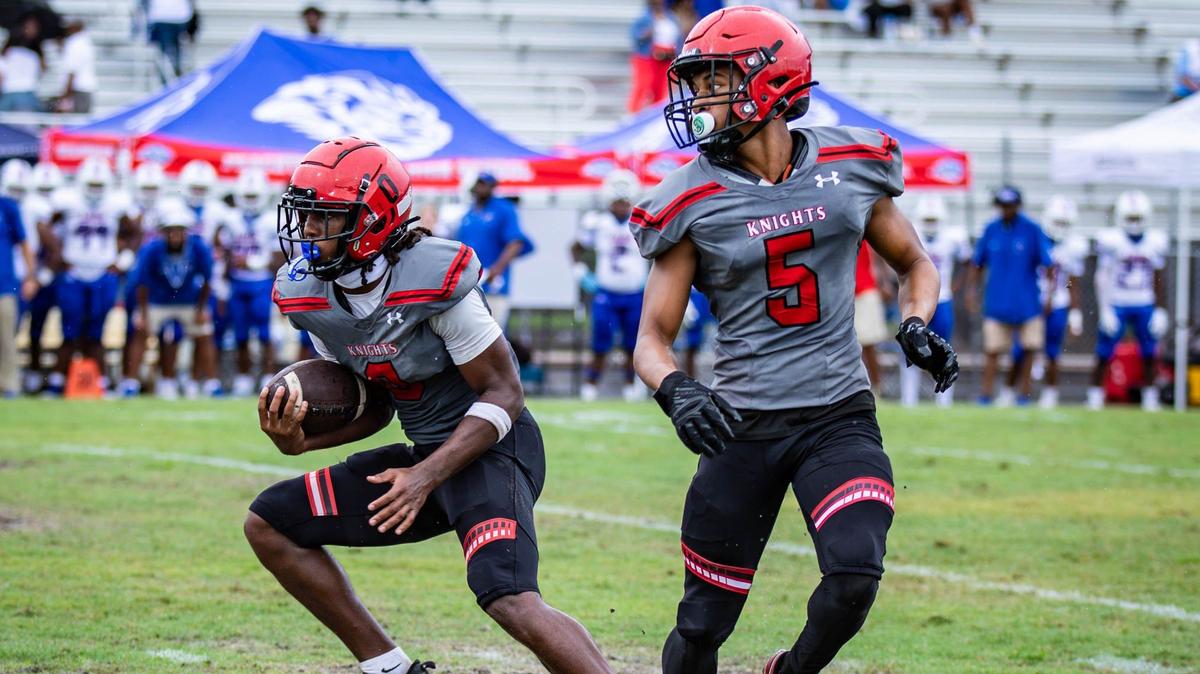 Monarch Knights wide receiver Samari Reed (0) runs with the ball in the first half of his football game against the Peachtree Ridge Lions at Coconut Creek High School on Thursday, Aug. 22, 2024, in Coconut Creek, Fla.