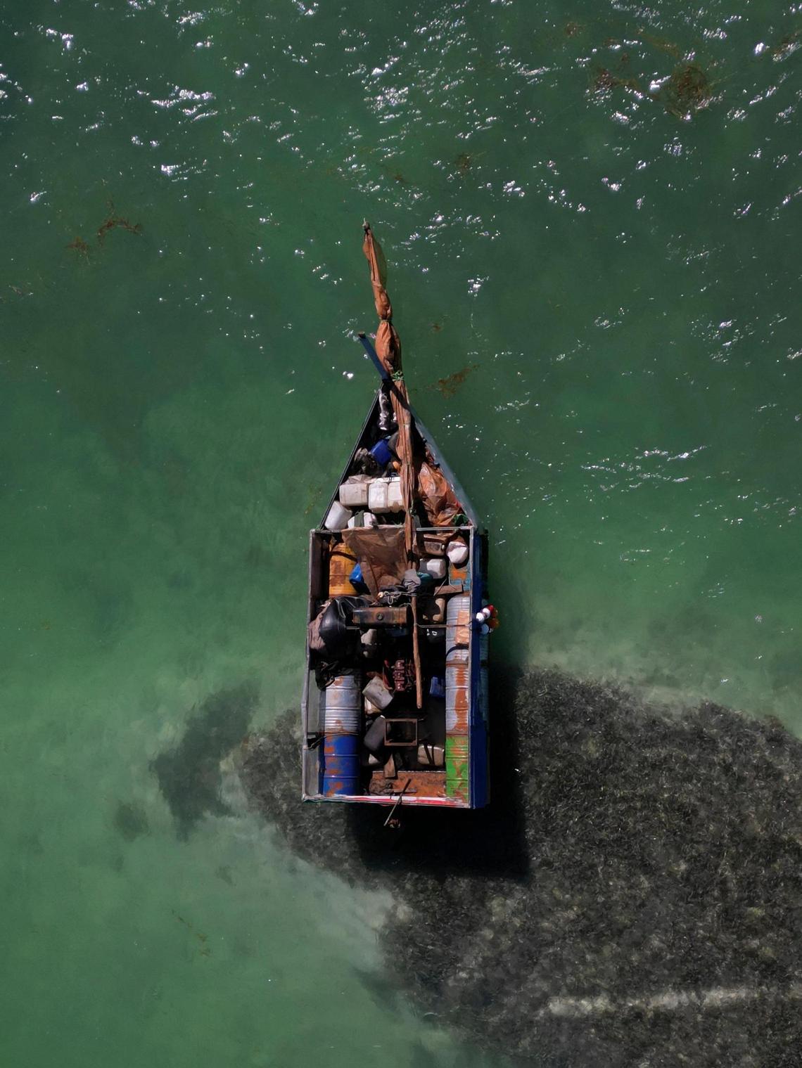 Duck Key, Florida Keys,FL - January 14, 2023 A vessel used by Cuban migrants floats off Duck Key in the Florida keys.