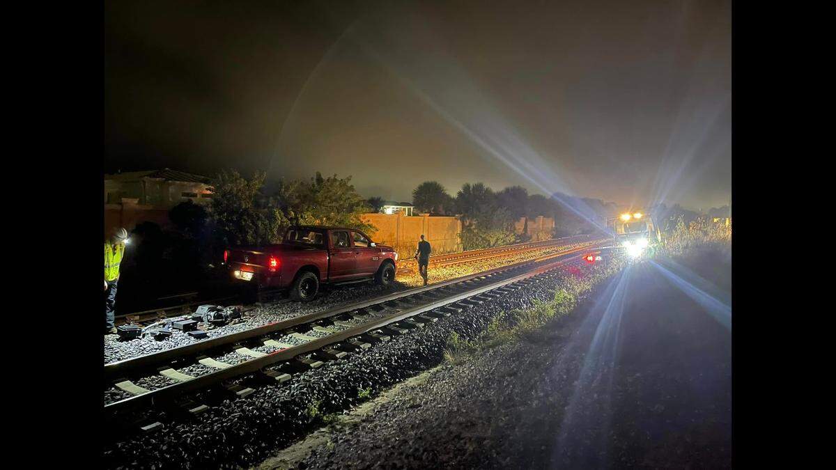 “The train’s conductor was successfully able to maneuver an emergency stop nearly avoiding a collision,” officials says.