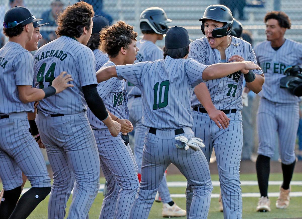 Varela Varsity Vipers Simon Molina (77) celebrates his hit against the Columbus Explorers in the second inning during the GMAC baseball championship game at Christopher Columbus High School in Miami, Fl on Thursday, April 20, 2023.