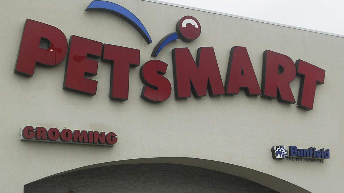 FILE - This May 24, 2005, file photo shows a sign of a pet store chain, PetSmart, in Warwick, R.I. PetSmart’s online pet store Chewy is selling its stock in an initial public offering that may revive memories of the days when its breed of internet retailing seemed like a lost cause. The Dania Beach, Florida, company is setting out to raise $100 million, but that figure listed in documents filed Monday, April 29, 2019, is likely to change in the weeks ahead as Chewy’s bankers gauge investor demand for the IPO. (AP Photo/Stew Milne, File)