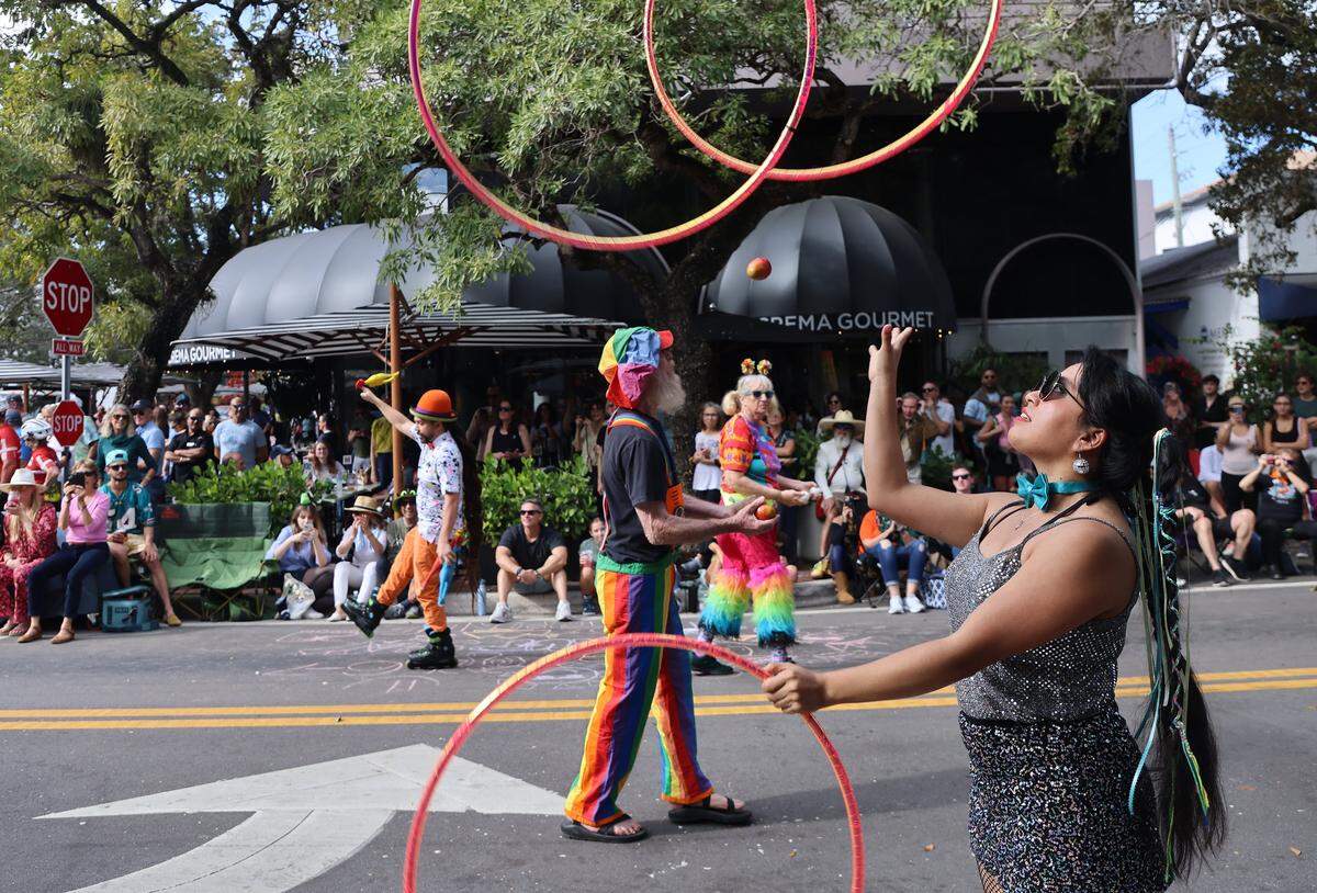 Members of the Coconut Grove Juggling Exchange perform the crowd during the 42nd Annual King Mango Strut - a wacky, fun-filled parade celebrating the quirks, humorous, and satirical political statements held on Sunday, January 4, 2026, in the heart of the Grove in Miami, Florida. 