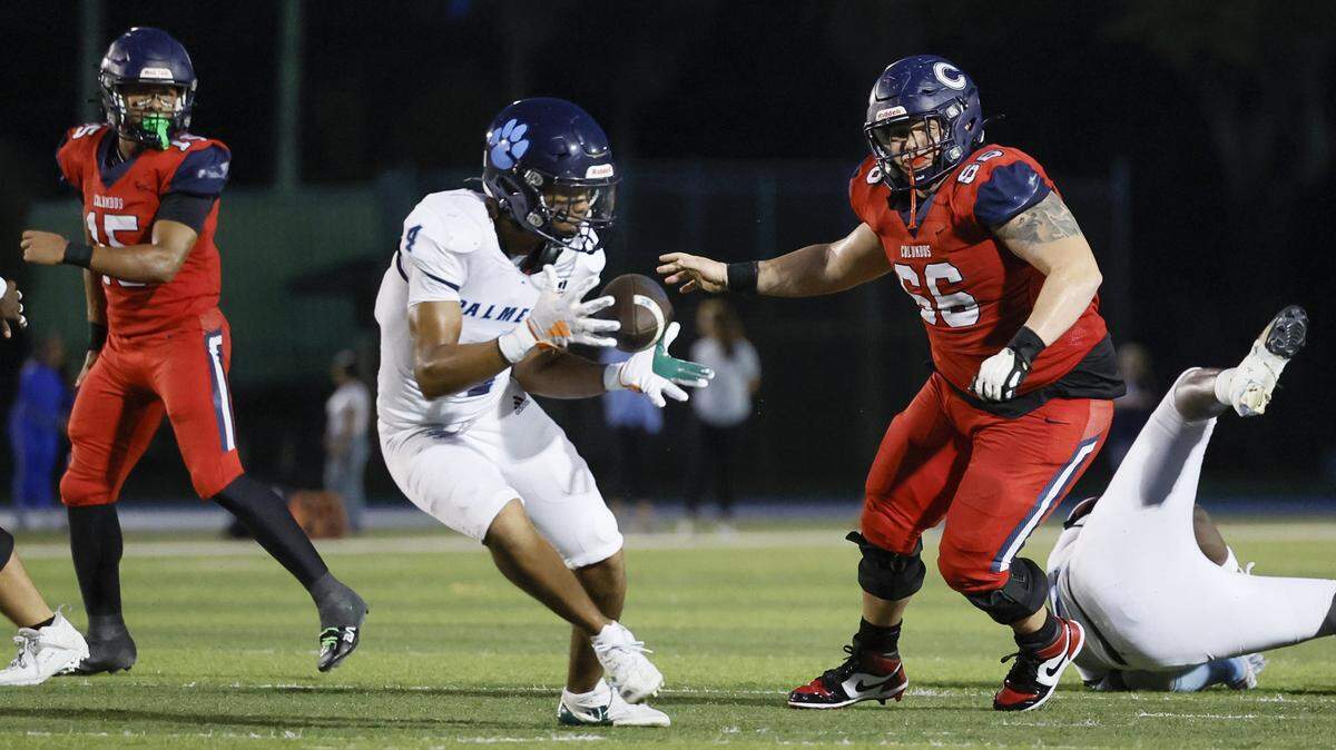 Miami Palmetto High linebacker Denzley Balthazar (4) gets hold of a Columbus High fumble in the first half at Tropical Park in Miami, Florida on Friday, September 12, 2025.