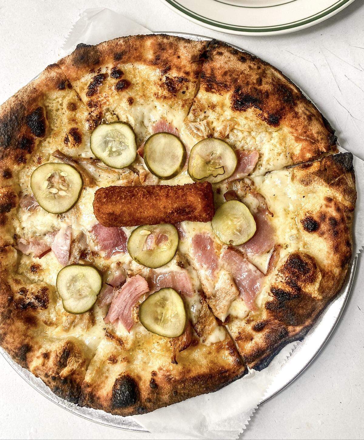 The Cubano Pizza is the pizza of the month for September at Harry’s Pizzeria in Coconut Grove and on Miami Beach.