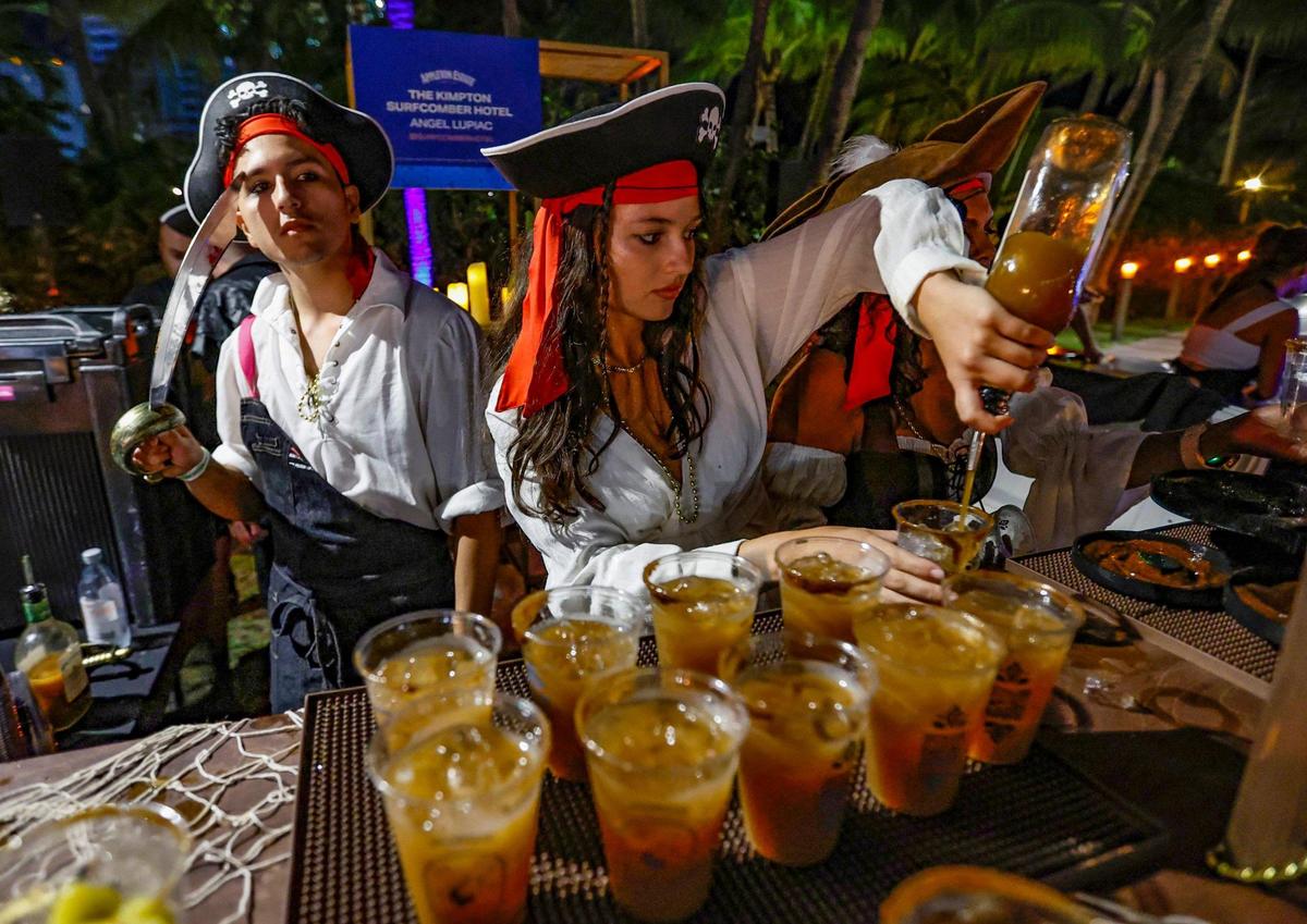Sabrina Killgo mixes drinks during the Art of Tiki Cocktail Showdown at the South Beach Wine & Food Festival at the Kimpton Surfcomber Hotel in Miami Beach, Florida on Saturday, February 25, 2023.