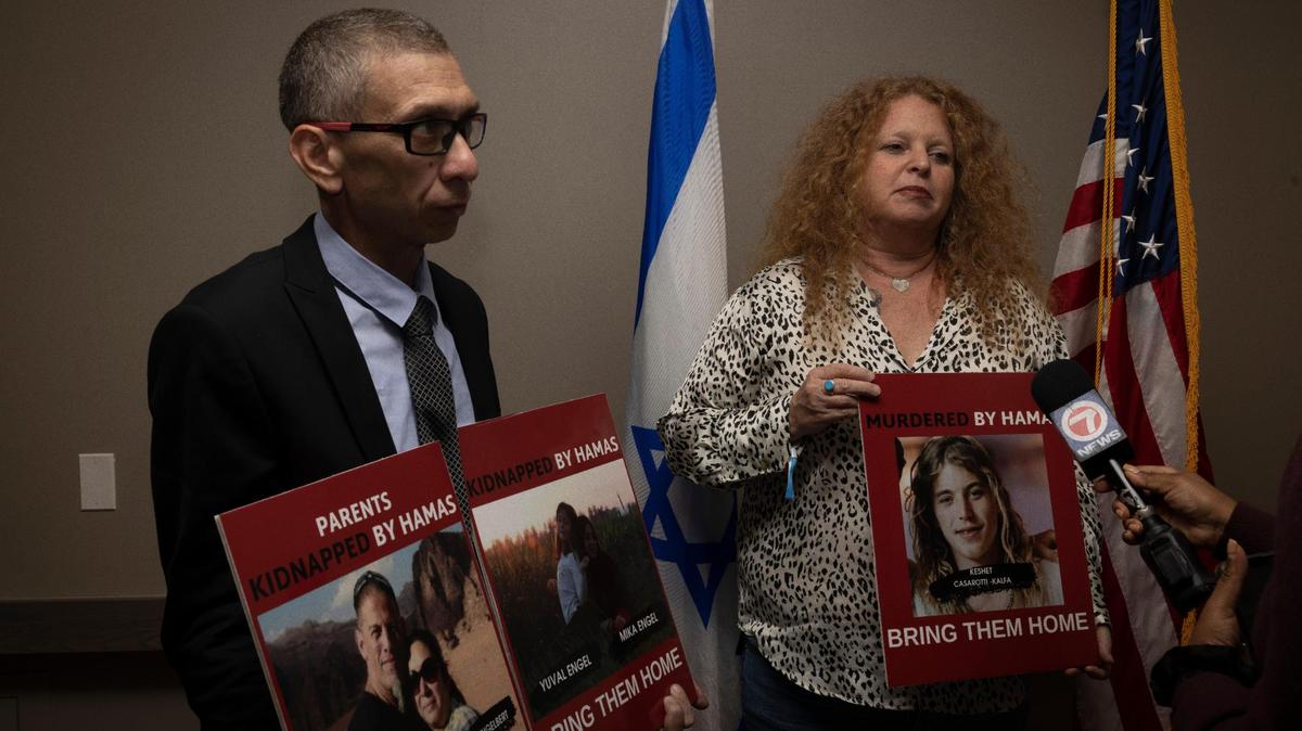 Diego Engelbert, left, whose family members are hostages of Hamas and Natalia Casarotti, whose son was killed by Hamas, speak to the media during the North American Mayors Summit Against Antisemitism on Wednesday, Nov. 15, 2023, at the W Hotel in Fort Lauderdale.