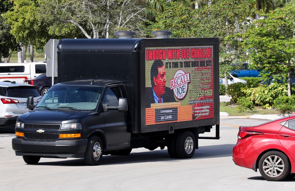 A truck outside Miami City Hall promoting the recall of Miami Commissioner Joe Carollo during a press conference by petition organizers on Feb. 11.