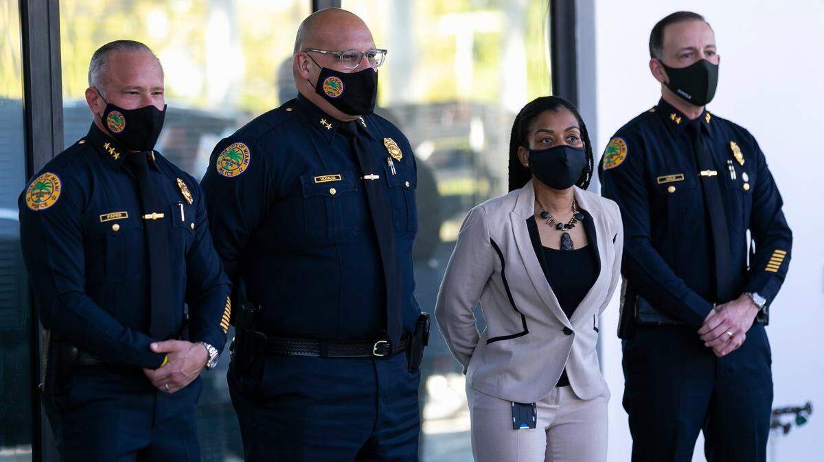 Assistant Police Chief Manny Morales, second from left, was appointed interim chief by the city manager, who suspended Chief Art Acevedo Monday with the intention of his firing.